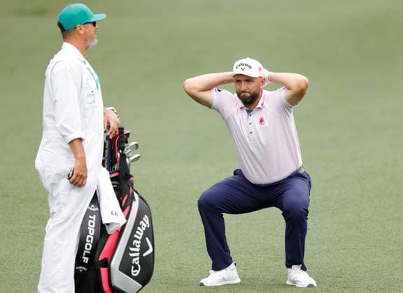 Jon Rahm os Spain stretches on the 9th fairway during a practice round on the Monday before The Masters Tournament at Augusta National Golf Club on Monday, April 6, 2026 in Augusta, Georgia.  AUG20260406144 JOHNxANGELILLO