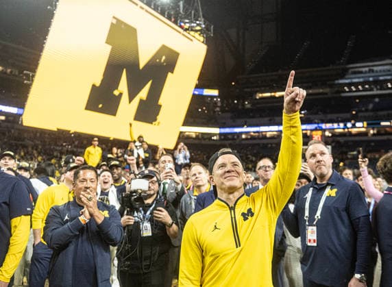 April 7, 2026, Indianapolis, Indiana, USA: Michigan head coach Dusty May celebrates after defeating the UConn Huskies for the NCAA, College League, USA Mens Basketball Championship, 69-63. Monday, April 7, 2026. Indianapolis USA - ZUMAr44_ 20260407_zsp_r44_001 Copyright: xThomasxJ.xRussox