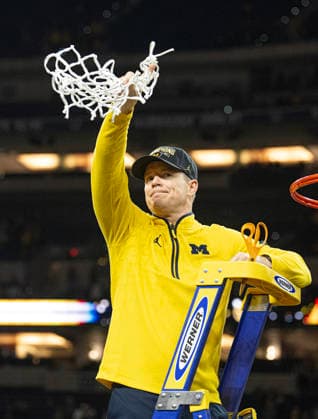 April 6, 2026, Indianapolis, Indiana, USA: Michigan head coach Dusty May celebrates after defeating the UConn Huskies for the NCAA, College League, USA Mens Basketball Championship, 69-63. Monday, April 7, 2026. Indianapolis USA - ZUMAr44_ 20260406_zsp_r44_004 Copyright: xThomasxJ.xRussox