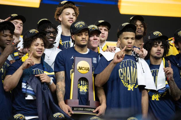 April 6, 2026, Indianapolis, Indiana, USA: Michigan celebrates after defeating the UConn Huskies for the NCAA, College League, USA Mens Basketball Championship, 69-63. Monday, April 7, 2026. Indianapolis USA - ZUMAr44_ 20260406_zsp_r44_022 Copyright: xThomasxJ.xRussox