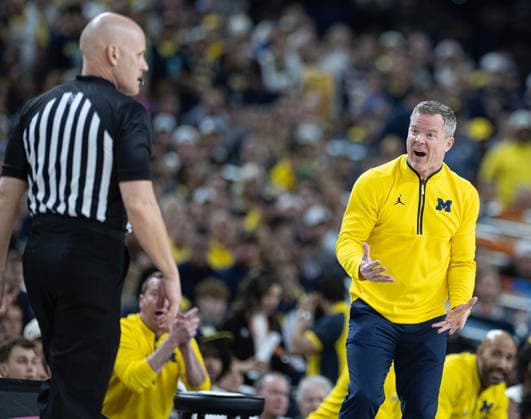 April 6, 2026, Indianapolis, Indiana, USA: Michigan head coach Dusty May reacts during first half action against the UConn Huskies during the NCAA, College League, USA Mens Basketball Championship. Michigan went on to win, 69-63. Monday, April 7, 2026. Indianapolis USA - ZUMAr44_ 20260406_zsp_r44_023 Copyright: xThomasxJ.xRussox