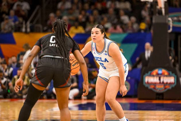 NCAA, College League, USA Final Four Basketball: South Carolina Gamecocks at UCLA Bruins UCLA Bruins guard Charlisse Leger-Walker (5) looks to pass the ball in the second half of the NCAA Final Four basketball game against the South Carolina Gamecocks in Phoenix, Arizona, Sunday, April 5, 2026. UCLA defeated South Carolina 79-51 (Thomas Fernandez Image of . Phoenix Arizona United States EDITORIAL USE ONLY Copyright: xImagexofxSportx ThomasxFernandezx iosphotos404885