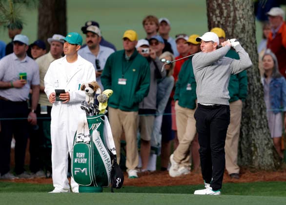Rory McIlroy of Northern Ireland hits an approach shot to the 7th green during a practice round on the Tuesday before The Masters Tournament at Augusta National Golf Club on Tuesday, April 7, 2026 in Augusta, Georgia.  AUG20260407102 JOHNxANGELILLO