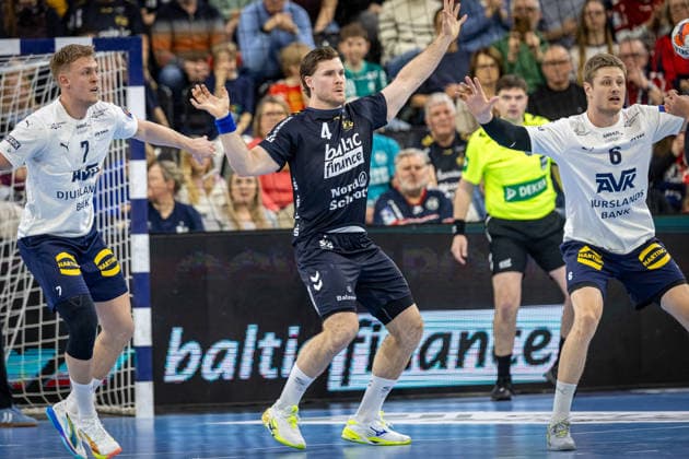 FLENSBURG, GERMANY - APRIL 7: Christoffer Sundsgaard Dreyer (SAH - Aarhus, 07), Johannes Golla (SG Flensburg-Handewitt, 04), Kristian Bach Bonefeld (SAH - Aarhus, 06) during the EHF European League Play-Offs Return Leg between SG Flensburg-Handewitt vs SAH - Aarhus at GP JOULE Arena on April 7, 2026 in Flensburg, Germany. Schleswig-Holstein Germany Copyright: xMarioxM.xKobergx