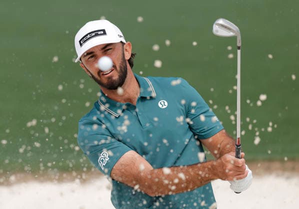 Max Homa hits out of a bunker to the 7th green during a practice round on the Tuesday before The Masters Tournament at Augusta National Golf Club on Tuesday, April 7, 2026 in Augusta, Georgia.  AUG20260407126 JOHNxANGELILLO