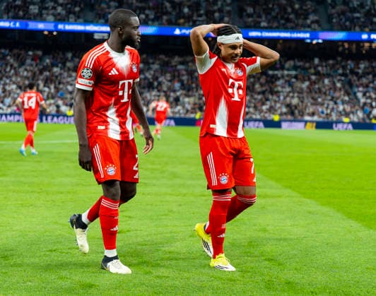 07 04 2026, Football UEFA Champions League 2025 2026 quarter-finals, Real Madrid FC Bayern Munich, at Estadio Bernabeu in Madrid Spain , v li Dayot Upamecano FC Bayern Munich , Serge Gnabry FC Bayern Munich