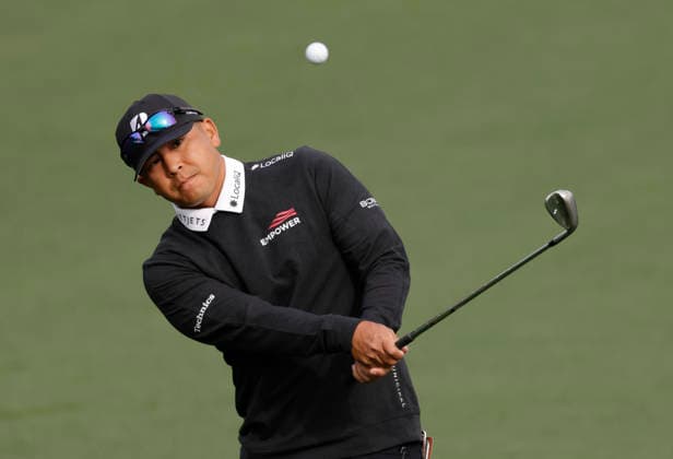Kurt Kitayama hits a pitch shot to the 7th green during a practice round on the Tuesday before The Masters Tournament at Augusta National Golf Club on Tuesday, April 7, 2026 in Augusta, Georgia.  AUG20260407119 JOHNxANGELILLO