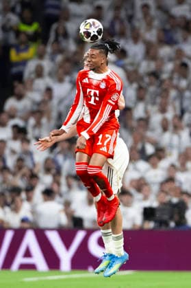 UEFA champions league - Real Madrid vs Bayern Munchen MADRID, SPAIN - April 7:Michael Olise of Bayern Munich and Alvaro Carreras of Real Madrid in action during the UEFA champions league 2025 26 Quarter-finals first leg match between Real Madrid and Bayern Munchen at Santiago Bernabeu Stadium. (Photo by Guille Martinez f22photo) Madrid Santiago Bernabeu Stadium Spain Copyright: xGuillermoxMartinezx