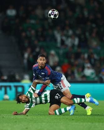 William Saliba of Arsenal competes for the ball with Luis Suarez of Sporting Sporting v Arsenal, UEFA Champions League, Quarter Final, First Leg, Football, Estadio Jose Alvalade, Lisbon, Portugal - 07 Apr 2026Lisbon Estádio José Alvalade Portugal EDITORIAL USE ONLY No use with unauthorised audio, video, data, fixture lists, club league logos or live services. Online in-match use limited to 120 images, no video emulation. No use in betting, games or single club league player publications.  Copyright: xMichaelxZemanek Shutterstockx 16811860l