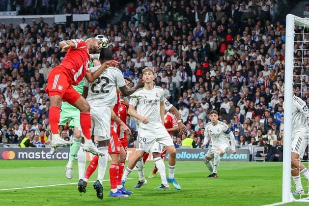 Jonathan Tah 4 FC Bayern Muenchen with a header, against Antonio Ruediger 22 Real Madrid and Dean Huijsen 24 Real Madrid , Real Madrid vs FC Bayern Muenchen, Football, Men, UEFA Champions League, Season 2025 2026, Quarter Final First Leg Quarter Finals 1st Leg , 07 04 2026 Madrid Madrid Spain Copyright: xkolbert-press MartinxAgüerax