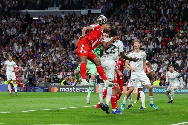 Jonathan Tah 4 FC Bayern Muenchen with a header , Action, against Antonio Ruediger 22 Real Madrid , Real Madrid vs FC Bayern Muenchen, Football, Men, UEFA Champions League, Season 2025 2026, Quarter Final First Leg Quarter Finals 1st Leg , 07 04 2026 Madrid Madrid Spain Copyright: xkolbert-press MartinxAgüerax