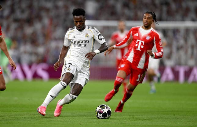 FOOTBALL CHAMPIONS LEAGUE SEASON 2025 2026 Quarter-final first leg 07 04 2026 Real Madrid FC Bayern Muenchen Vinicius Junior left, Real Madrid v Michael Olise right, FC Bayern Muenchen