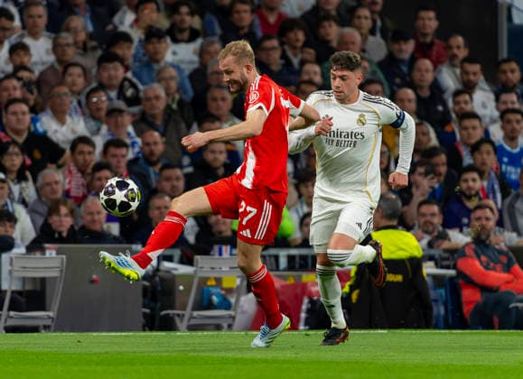 07 04 2026, Football UEFA Champions League 2025 2026 quarter-finals, Real Madrid FC Bayern Munich, at Estadio Bernabeu in Madrid Spain , v lI Konrad Laimer FC Bayern Munich vs Federico Valverde Real Madrid