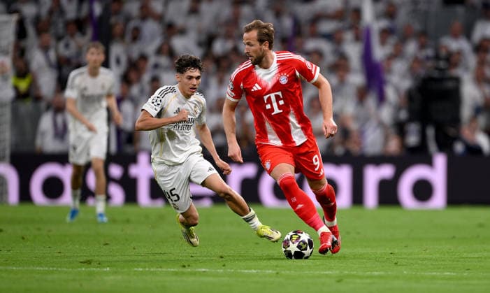 FOOTBALL CHAMPIONS LEAGUE SEASON 2025 2026 Quarter-final first leg 07 04 2026 Real Madrid FC Bayern Muenchen Thiago Pitarch left, Real Madrid v Harry Kane right, FC Bayern Muenchen