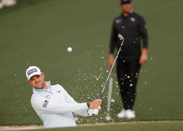 Corey Conners of Canada hits out of the bunker to the 7th green during a practice round on the Tuesday before The Masters Tournament at Augusta National Golf Club on Tuesday, April 7, 2026 in Augusta, Georgia.  AUG20260407117 JOHNxANGELILLO