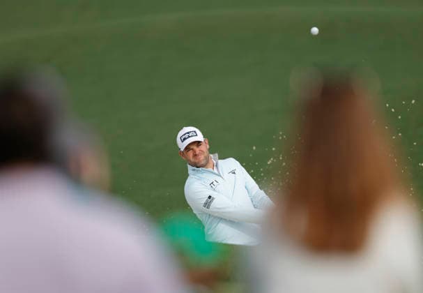 Corey Conners of Canada hits out of the bunker to the 7th green during a practice round on the Tuesday before The Masters Tournament at Augusta National Golf Club on Tuesday, April 7, 2026 in Augusta, Georgia.  AUG20260407120 JOHNxANGELILLO