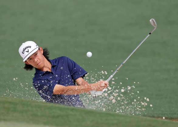 Ethan Fang hits out of a bunker to the 2nd hole during a practice round on the Tuesday before The Masters Tournament at Augusta National Golf Club on Tuesday, April 7, 2026 in Augusta, Georgia.  AUG20260407124 JOHNxANGELILLO