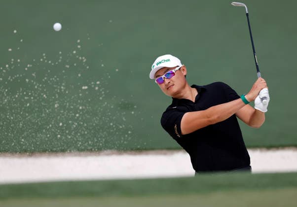 Haotong Li of China hits out of the bunker to the 7th green during a practice round on the Tuesday before The Masters Tournament at Augusta National Golf Club on Tuesday, April 7, 2026 in Augusta, Georgia.  AUG20260407125 JOHNxANGELILLO