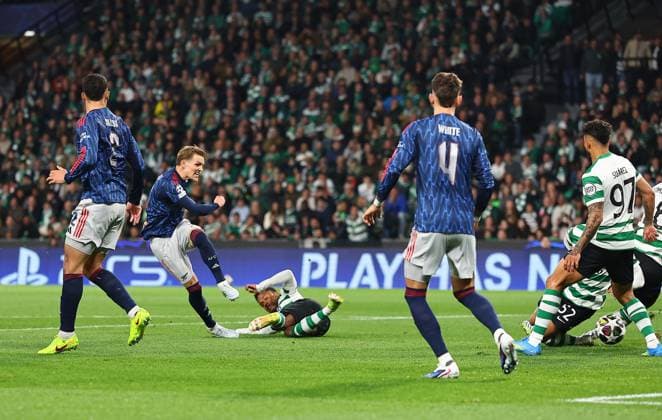 Martin Odegaard of Arsenal has a shot Sporting v Arsenal, UEFA Champions League, Quarter Final, First Leg, Football, Estadio Jose Alvalade, Lisbon, Portugal - 07 Apr 2026Lisbon Estádio José Alvalade Portugal EDITORIAL USE ONLY No use with unauthorised audio, video, data, fixture lists, club league logos or live services. Online in-match use limited to 120 images, no video emulation. No use in betting, games or single club league player publications.  Copyright: xMichaelxZemanek Shutterstockx 16811860o