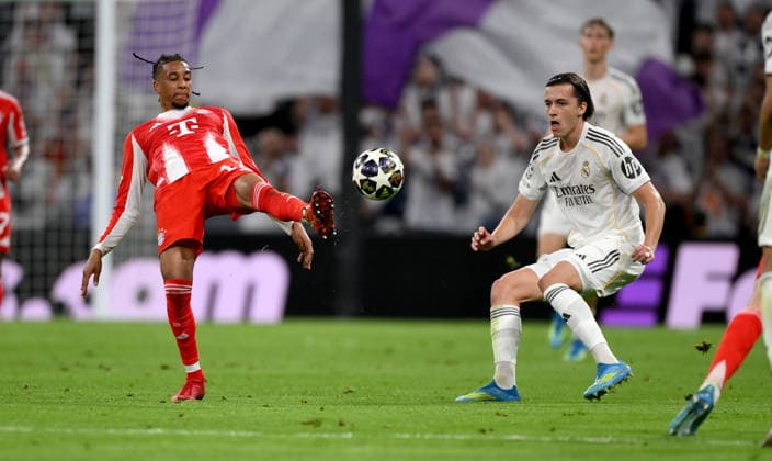 FOOTBALL CHAMPIONS LEAGUE SEASON 2025 2026 Quarter-final first leg 07 04 2026 Real Madrid FC Bayern Muenchen Michael Olise left, FC Bayern Muenchen v Alvaro Carreras right, Real Madrid