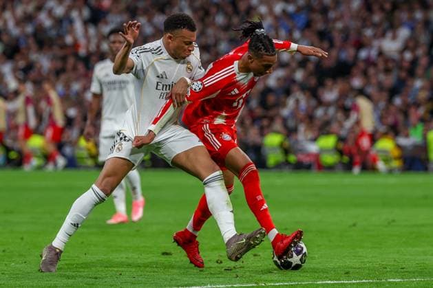 Kylian Mbappe 10 Real Madrid in action with Michael Olise 17 FC Bayern Muenchen , Real Madrid vs FC Bayern Muenchen, Football, Men, UEFA Champions League, Season 2025 2026, Quarter Final First Leg Quarter Finals 1st Leg , 07 04 2026 Madrid Madrid Spain Copyright: xkolbert-press MartinxAgüerax