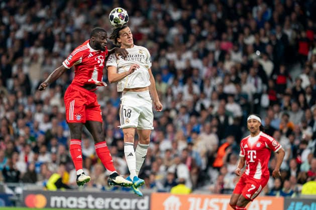 Real Madrid CF s Alvaro Carreras and Bayern Munchen™s Dayot Upamecano during Champions League 2025 2026, Quarter-finals, first Leg match. April 7, 2026 (202604071079)