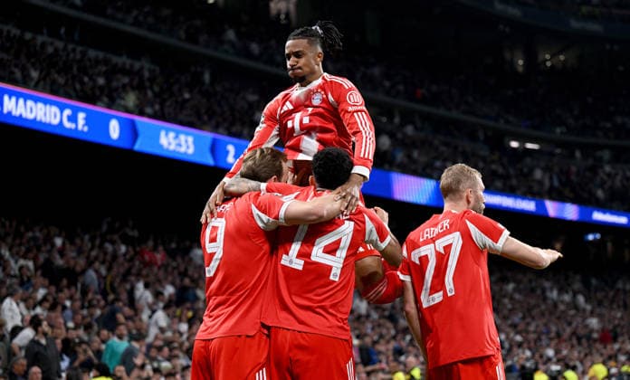 FOOTBALL CHAMPIONS LEAGUE SEASON 2025 2026 quarter-final first leg 07 04 2026 Real Madrid FC Bayern Muenchen cheering FC Bayern Muenchen after the goal to 0 2, from left , goal scorer Harry Kane , Luis Diaz , Konrad Laimer , on top Michael Olise