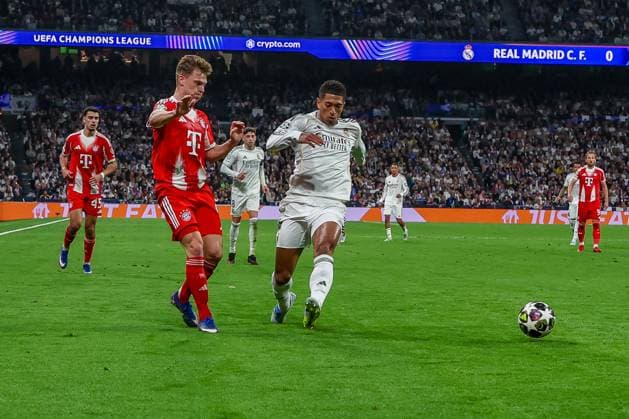 Joshua Kimmich 6 FC Bayern Muenchen in action against Jude Bellingham 5 Real Madrid , Real Madrid vs FC Bayern Muenchen, Football, Men, UEFA Champions League, Season 2025 2026, Quarter Final First Leg Quarter Finals 1st Leg , 07 04 2026 Madrid Madrid Spain Copyright: xkolbert-press MartinxAgüerax