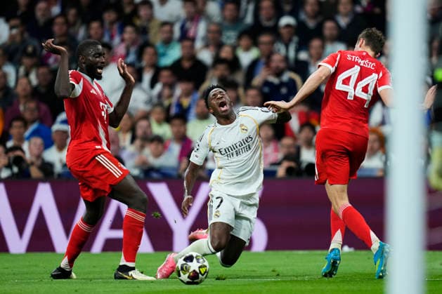 ESP: Real Madrid v Bayern Munich. UEFA Champions League. Quarter-Finals, First Leg. Vinicius Junior of Real Madrid CF and Josip Stanisic of FC Bayern Munchen during the UEFA Champions League match, between Real Madrid and Bayern Munich, Quarter-Finals, first leg, played at Santiago Bernabeu Stadium on April 7, 2026 in Madrid, Spain. Copyright: xCesarxCebollax xPRESSINPHOTOx PS_260407_RMA_BAY_2526_103