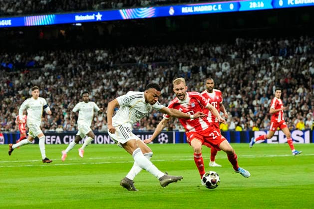 ESP: Real Madrid v Bayern Munich. UEFA Champions League. Quarter-Finals, First Leg. Kylian Mbappe of Real Madrid CF and Konrad Laimer of FC Bayern Munchen during the UEFA Champions League match, between Real Madrid and Bayern Munich, Quarter-Finals, first leg, played at Santiago Bernabeu Stadium on April 7, 2026 in Madrid, Spain. Copyright: xCesarxCebollax xPRESSINPHOTOx PS_260407_RMA_BAY_2526_111