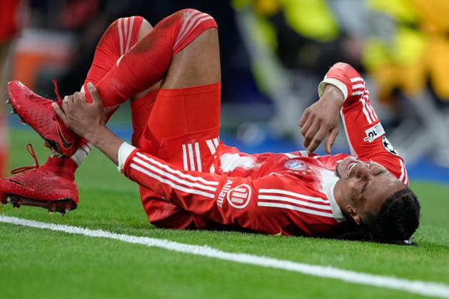 April 7, 2026, Madrid, Madrid, Spain: Michael Olise of Bayern Munich hurts during the UEFA Champions League 2025 26 Quarter-finals First Leg match between Real Madrid C.F. and Bayern Munich at Bernabeu stadium on April 07, 2026, in Madrid, Spain. Madrid Spain - ZUMAa181 20260407_zaa_a181_506 Copyright: xOscarxJ.xBarrosox