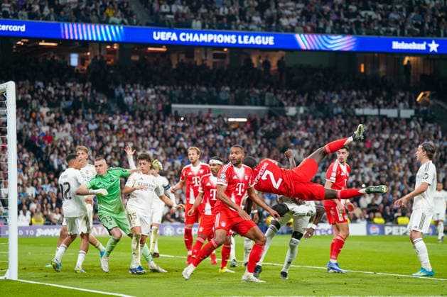 Spain Football UEFA Champions League 2025 2026, quarter-final Real Madrid vs FC Bayern Munich Bernabeu Madrid penalty area scene Real Dayot Upamecano FC Bayern Munich, 2 flies through the penalty area Copyright: xJOERANxSTEINSIEKx