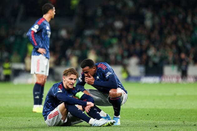 LISBON, PORTUGAL - APRIL 7: Martin odegaard of Arsenal and Gabriel Magalhaes of Arsenal during the UEFA Champions League 2025 26 Quarter-Final First Leg match between Sporting Clube de Portugal and Arsenal FC at Estadio Jose Alvalade on April 7, 2026 in Lisbon, Portugal.  Copyright: xMBxMediax