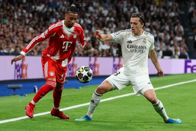 Action between Michael Olise 17 FC Bayern Muenchen and Alvaro Fernandez Carreras 18 Real Madrid , Real Madrid vs FC Bayern Muenchen, Football, Men, UEFA Champions League, Season 2025 2026, Quarter Final First Leg Quarter Finals 1st Leg , 07 04 2026 Madrid Madrid Spain Copyright: xkolbert-press MartinxAgüerax