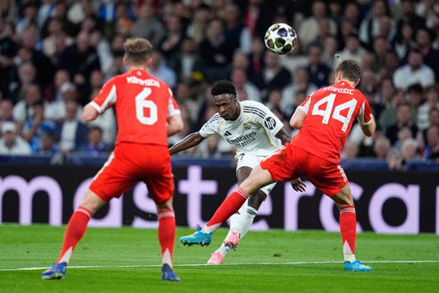 April 7, 2026, Madrid, Madrid, Spain: Vinicius Junior of Real Madrid CF shoots during the UEFA Champions League 2025 26 Quarter-finals First Leg match between Real Madrid C.F. and Bayern Munich at Bernabeu stadium on April 07, 2026, in Madrid, Spain. Madrid Spain - ZUMAa181 20260407_zaa_a181_348 Copyright: xDennisxAgyemanx