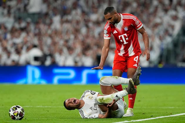 REAL MADRID CF v BAYERN MUNCHEN. CHAMPIONS LEAGUE 2025 2026. QUARTER FINALS. 1ST LEG MATCH. Real Madrid CF s Kylian Mbappe injured (l) and Bayern Munchen™s Jonathan Tah during Champions League 2025 2026, Quarter-finals, first Leg match. April 7, 2026 (ALTERPHOTOS Acero) MadridSpain  Copyright: xAcerox