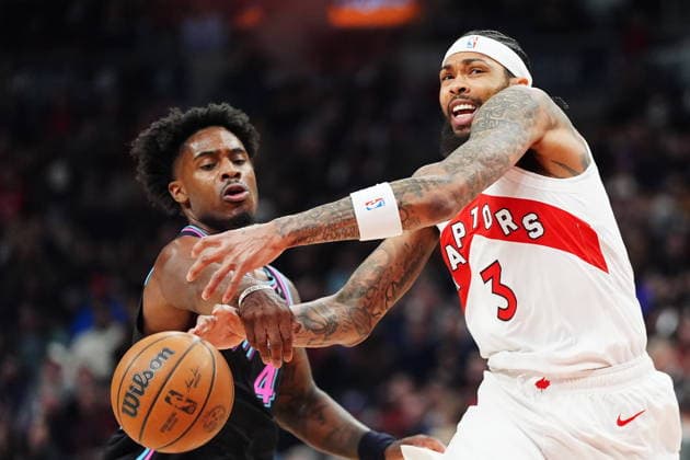 April 7, 2026, Toronto, On, CANADA: Toronto Raptors Brandon Ingram (3) is fouled by Miami Heat s Davion Mitchell (45) during first half NBA, Basketball Herren, USA basketball action in Toronto on Tuesday, April 7, 2026. Canada News - April 7, 2026  - ZUMAc35_ 20260407_zaf_c35_099 Copyright: xFrankxGunnx