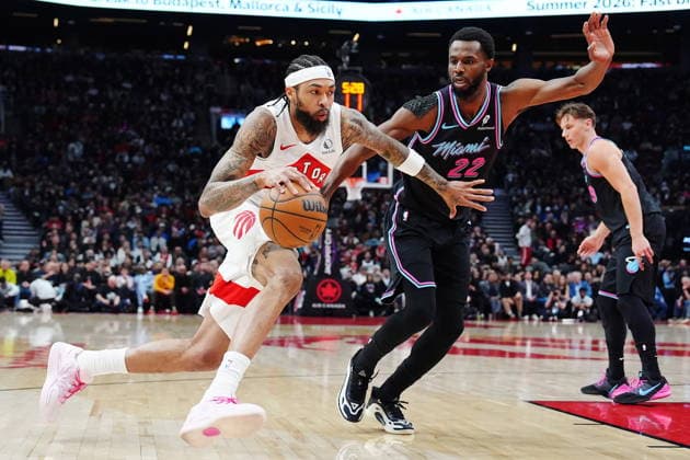 April 7, 2026, Toronto, On, CANADA: Toronto Raptors Brandon Ingram (3) drives past Miami Heat s Andrew Wiggins (22) during first half NBA, Basketball Herren, USA basketball action in Toronto on Tuesday, April 7, 2026. Canada News - April 7, 2026  - ZUMAc35_ 20260407_zaf_c35_140 Copyright: xFrankxGunnx