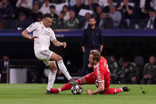 April 7, 2026, Madrid, Spain: Kylian Mbappe (L) of Real Madrid CF and Harry Kane (R) of FC Bayern Munchen are seen in action during the UEFA Champions League 2025 2026 quarter-finals first leg football match between Real Madrid CF and FC Bayern Munchen at Santiago Bernabeu stadium. Final score Real Madrid CF 1:2 FC Bayern Munchen Real Madrid CF Vs FC Bayern Munchen In Madrid - 07 Apr 2026  - ZUMAs197 20260407_aaa_s197_203 Copyright: xFedericoxTitonex