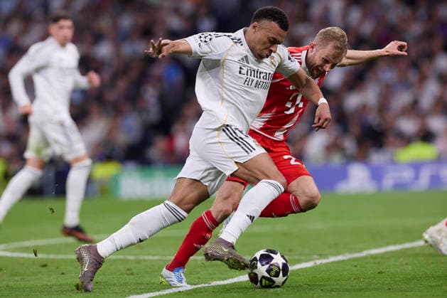 April 7, 2026, Madrid, Spain: Kylian Mbappe (L) of Real Madrid CF and Konrad Laimer (R) of FC Bayern Munchen are seen in action during the UEFA Champions League 2025 2026 quarter-finals first leg football match between Real Madrid CF and FC Bayern Munchen at Santiago Bernabeu stadium. Final score Real Madrid CF 1:2 FC Bayern Munchen Real Madrid CF Vs FC Bayern Munchen In Madrid - 07 Apr 2026  - ZUMAs197 20260407_aaa_s197_224 Copyright: xFedericoxTitonex