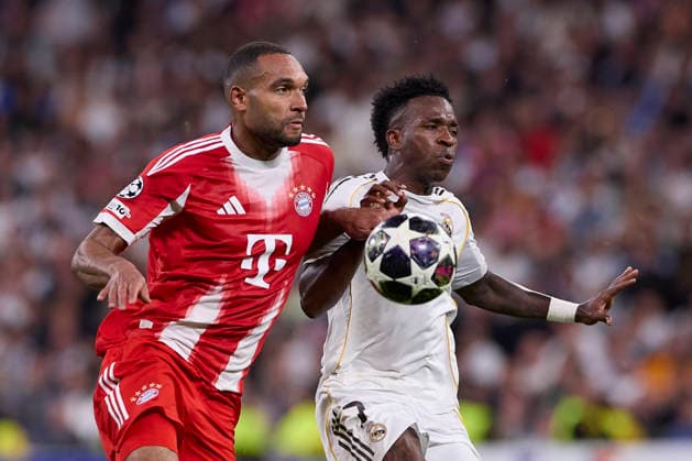 April 7, 2026, Madrid, Spain: Jonathan Tah (L) of FC Bayern Munchen and Vinicius Junior (R) of Real Madrid CF are seen in action during the UEFA Champions League 2025 2026 quarter-finals first leg football match between Real Madrid CF and FC Bayern Munchen at Santiago Bernabeu stadium. Final score Real Madrid CF 1:2 FC Bayern Munchen Madrid Spain - ZUMAs197 20260407_aaa_s197_247 Copyright: xFedericoxTitonex
