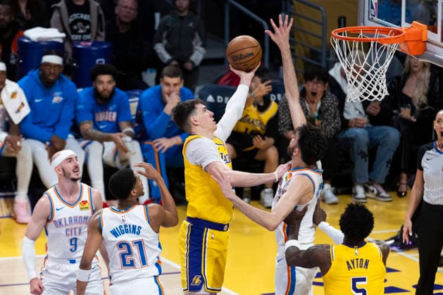 April 7, 2026, Los Angeles, California, USA: Los Angeles LakersÃ¢â‚¬â ¢ Jake LaRavia (12) goes to the basket against Oklahoma City ThunderÃ¢â‚¬â ¢s Chet Holmgren (7) during an NBA, Basketball Herren, USA basketball game at Crypto.com Arena on Tuesday, April 7, 2026 in Los Angeles. Los Angeles USA - ZUMAc68_ 20260407_zaf_c68_005 Copyright: xRingoxChiux
