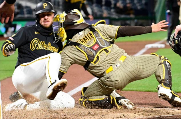 Sport Bilder des Tages #2 Pittsburgh Pirates left fielder Jake Mangum (28) slides pass San Diego Padres catcher Freddy Fermin (54) to score in the eighth inning of the 7-1 Pirates win against the San Diego Padres at PNC Park on Tuesday, April 7, 2026 in Pittsburgh.  PIT2026040722 ArchiexCarpenter