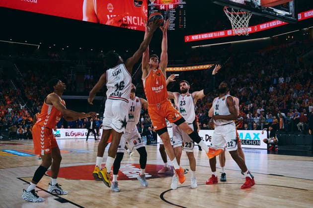 (260408) -- VALENCIA, April 8, 2026 -- Jaime Pradilla (top R) of Valencia vies for the ball with Zach LeDay (top L) of EA7 Emporio Armani Milan during the Euroleague basketball match between Valencia and EA7 Emporio Armani Milan in Valencia, Spain, on April 7, 2026. (Photo by Pablo Morano Xinhua) (SP)SPAIN-VALENCIA-BASKETBALL-EUROLEAGUE-VALENCIA VS EA7 EMPORIO ARMANI MILAN ChengxMin 