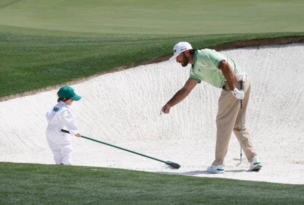 Max Homa directs his son Cam as they take part in the 2026 Masters golf tournament Par 3 Contest at Augusta National Golf Club in Augusta, Georgia, on Wednesday, April 8, 2026. The 2026 Masters Golf tournament begins on Thursday, April 9.  AUG20260408827 JOHNxANGELILLO