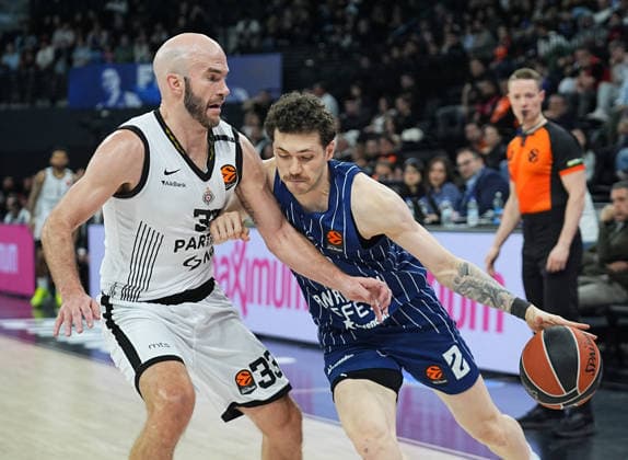 Anadolu Efes v Partizan - EuroLeague ISTANBUL, TURKIYE - APRIL 8: Sehmus Hazer (2) of Anadolu Efes and Nick Calathes (33) of Partizan battle for the ball during the Turkish Airlines EuroLeague Round 36 game at the Turkcell Basketball Development Center, on April 8, 2026, in Istanbul, Turkiye. Esra Bilgin Anadolu Istanbul Turkey. Editorial use only. Please get in touch for any other usage.  Copyright: x2026xAnadoluxEsraxBilginx