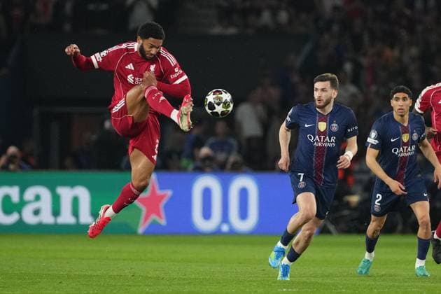 Joe Gomez of Liverpool and Khvicha Kvaratskhelia of PSG Paris Saint-Germain v Liverpool, UEFA Champions League, Quarter Final, First Leg, Football, Parc des Princes, Paris, France - 08 Apr 2026Paris Parc des Princes France EDITORIAL USE ONLY No use with unauthorised audio, video, data, fixture lists, club league logos or live services. Online in-match use limited to 120 images, no video emulation. No use in betting, games or single club league player publications. Copyright: xDavexWinter Shutterstockx 16811861aw
