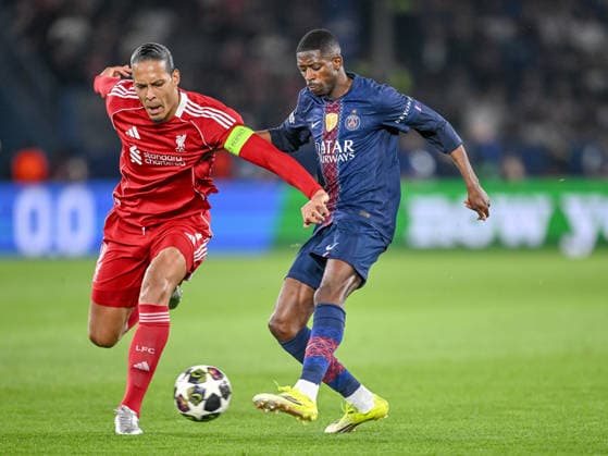 Virgil van Dijk Liverpool FC and Ousmane Dembele Paris Saint Germain FC battle for the ball during the UEFA Champions League 2025 26 Quarter Final First Leg match between Paris Saint Germain FC and Liverpool FC at Parc des Princes on April 8, 2026 in Paris, France Photo by Harry Langer DeFodi Images