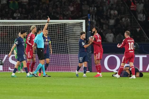 Joe Gomez of Liverpool receives a yellow card for a foul on Desire Doue of PSG Paris Saint-Germain v Liverpool, UEFA Champions League, Quarter Final, First Leg, Football, Parc des Princes, Paris, France - 08 Apr 2026Paris Parc des Princes France EDITORIAL USE ONLY No use with unauthorised audio, video, data, fixture lists, club league logos or live services. Online in-match use limited to 120 images, no video emulation. No use in betting, games or single club league player publications.  Copyright: xDavexWinter Shutterstockx 16811861bd