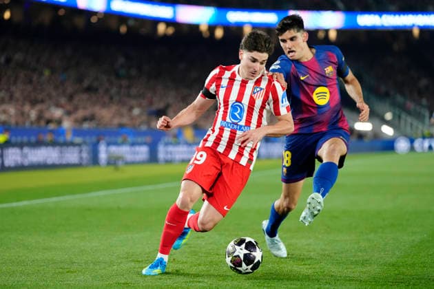 FC Barcelona, Barca v Atletico de Madrid - UEFA Champions League 2025 26 Quarter-Final First Leg Julian Alvarez centre-forward of Atletico de Madrid and Argentina and Gerard Martin left-back of Barcelona and Spain compete for the ball during the UEFA Champions League 2025 26 Quarter-Final First Leg match between FC Barcelona and Club AtlÃ tico de Madrid at Estadio Spotify Camp Nou on April 8, 2026 in Barcelona, Spain. Barcelona Spain  Copyright: xJosexBretonx originalFilename:bretonhernandez-fcbarcel260408_npAFD.jpg
